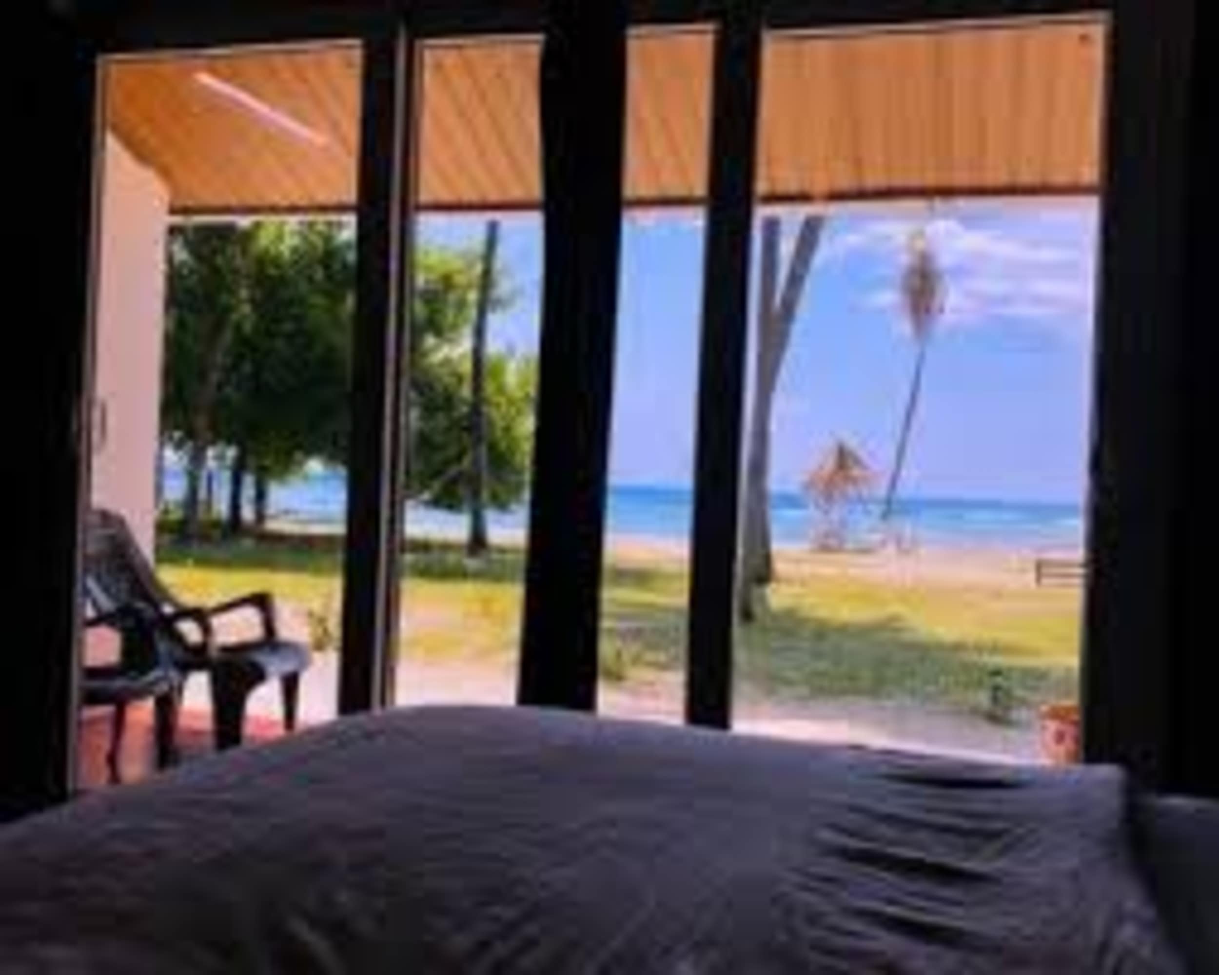 Coral Garden Beach Resort - Tap to explore photos