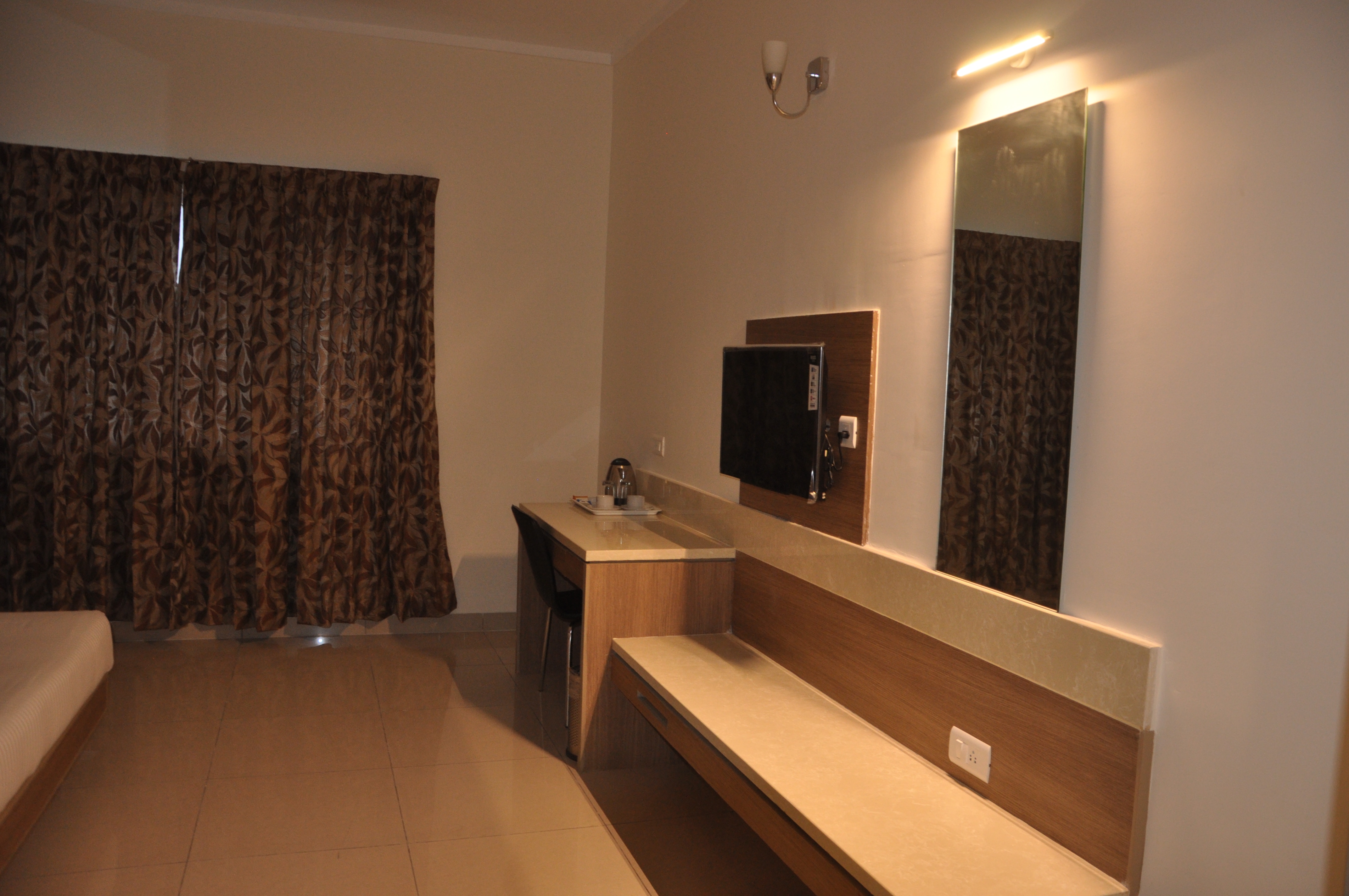 Hotel Rathna Residency - Tap to explore photos