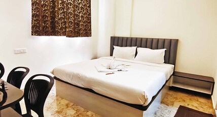 Grand UB Residency Room Type - Deluxe Room AC