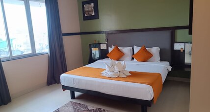 HOTEL POOJA GARDEN AND LODGING Room Type - Executive Suite Room
