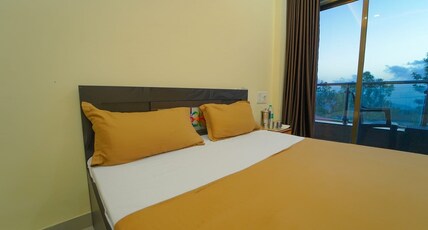 Prajakta Holiday Inn Room Type - Couple Room Valley Side with Balcony AC ROOM Prajakta Holiday Inn Room Type - Couple Room Valley Side with Balcony AC ROOM