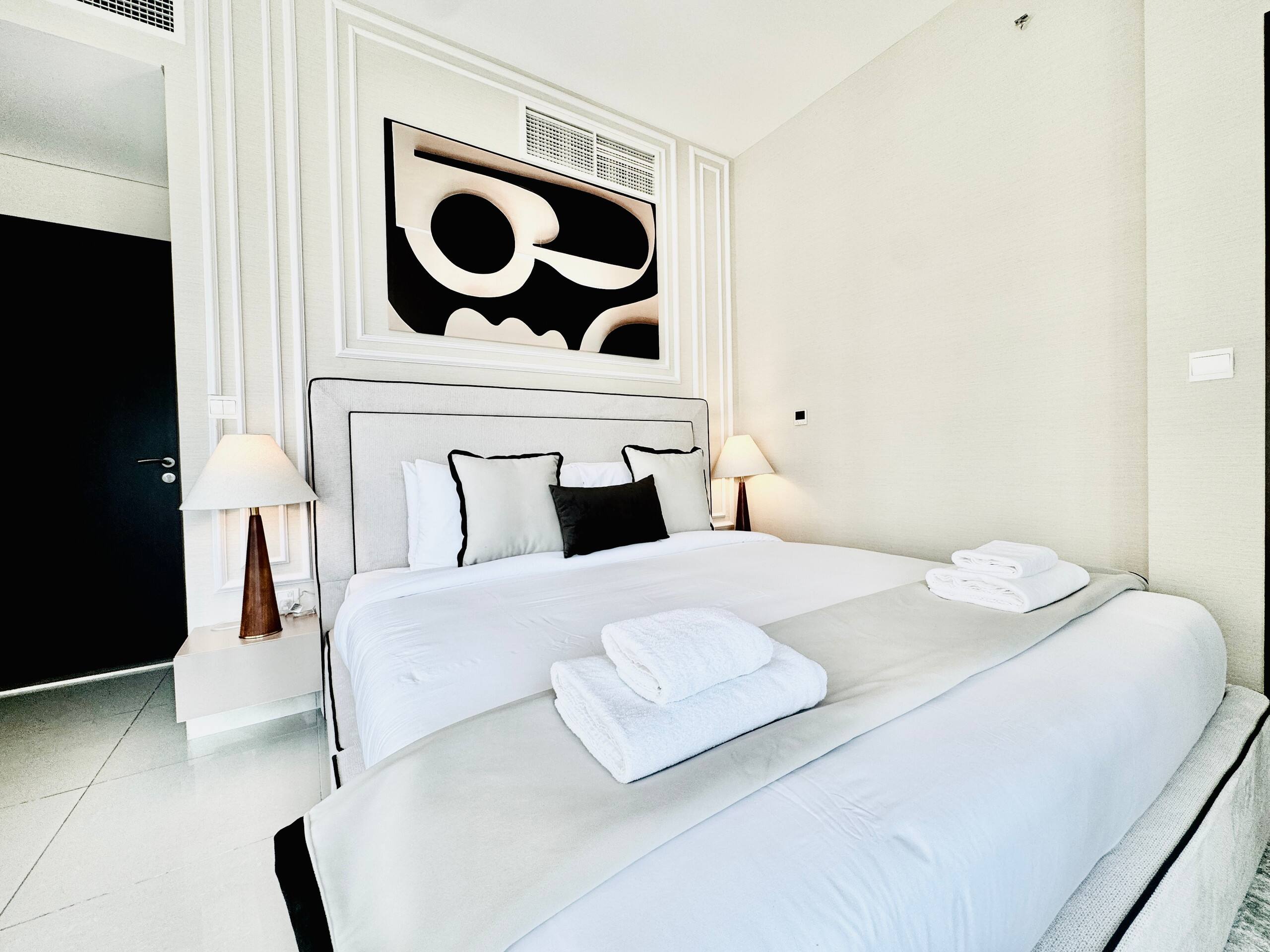 Sleek 1BR Near Burj Khalifa Pool Gym - Tap to explore photos