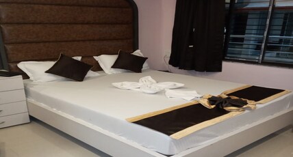 M JAC INTERNATIONAL Room Type - AC Deluxe Room With Balcony