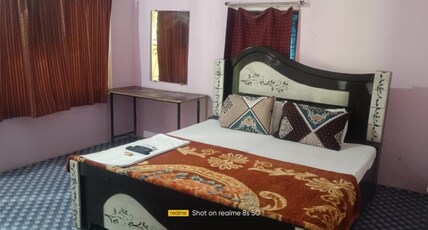 Satpura Safari Resort. Room Type - Deluxe AC Cottage River View