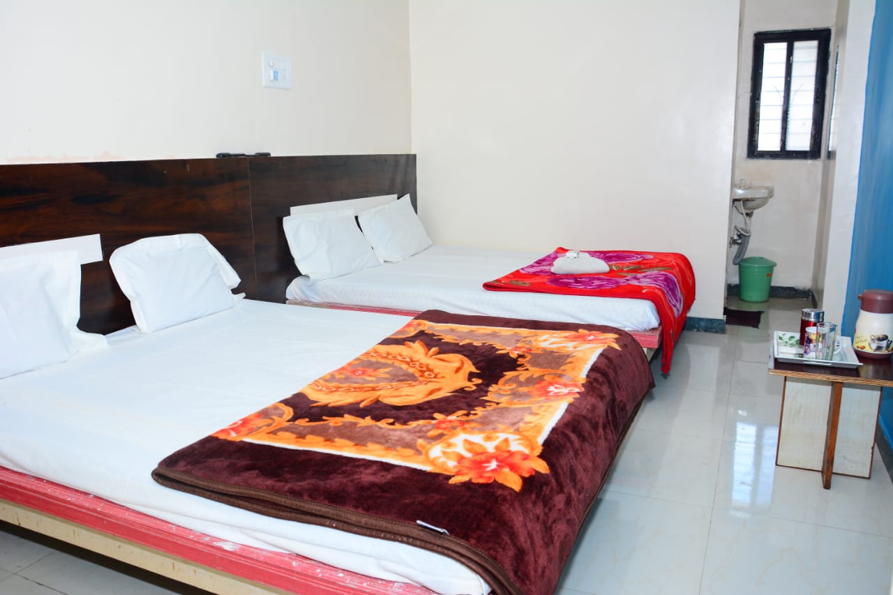 Hotel Sai Sulochana Inn - Tap to explore photos