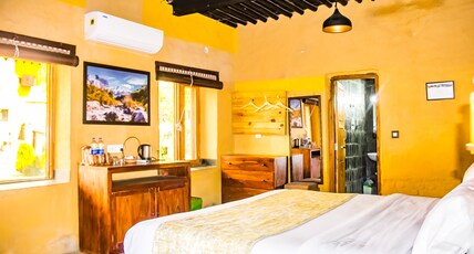 Prakriti Aalay - River side Mountain view Resort Room Type - Family room with Garden view Prakriti Aalay - River side Mountain view Resort Room Type - Family room with Garden view