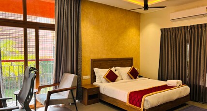 Naysa Green Athirappilly Room Type - Deluxe Room with Balcony