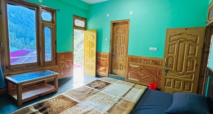 Trippy Trails Cafe and Homestay Room Type - Deluxe Room with Balcony