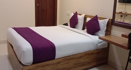 Purple Inn Suites HBR Layout Room Type - Deluxe Double AC
