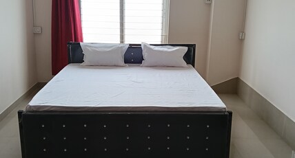 PB'S RESIDENCY Room Type - Bedroom