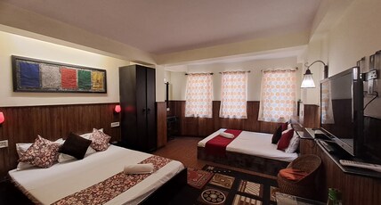 Hotel Kalika-Mall Road Room Type - Four Bed Deluxe Hotel Kalika-Mall Road Room Type - Four Bed Deluxe