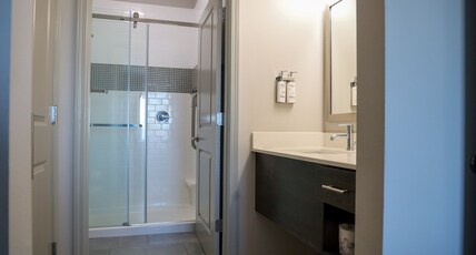 Staybridge Suites - Lake Charles, an IHG hotel Room Type - 1 King 1 Bedroom Suite Comm Accessible Sofa Bed