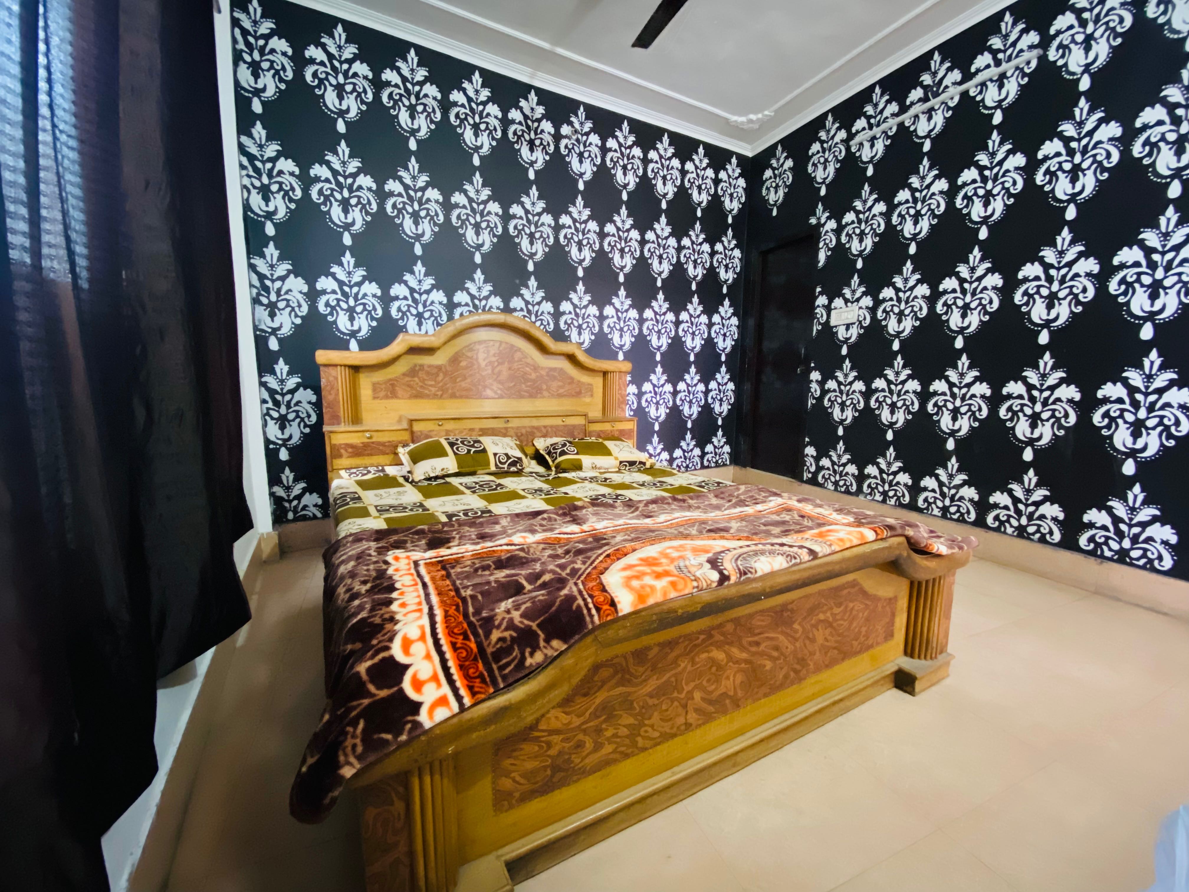 Hotel O Moonlight Guest House - Tap to explore photos