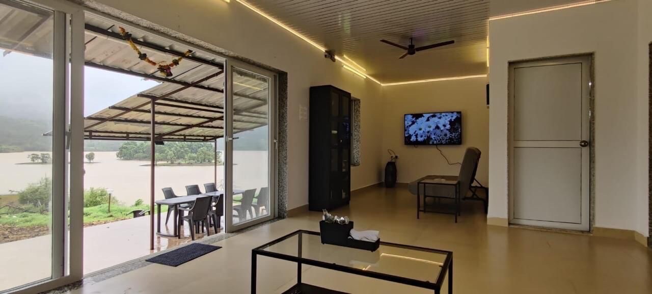 Kuteer by the lake 4bhk lake-Touch with private pool Pawna Lake Lonavala By The Explorer Stays - Tap to explore photos