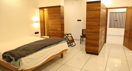 Quilon lake inn Room Type - Deluxe room Ac