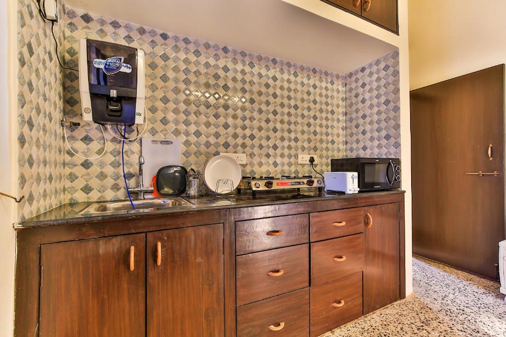Aspire Aguada Apt BeachTouch 1Bhk WiFi Pool Candolim - Tap to explore photos
