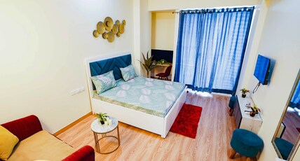 Richa's Home| Gaur City Mall Room Type - Studio Apartment | Balcony and Kitchenette