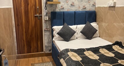 Kishan Home Stay Room Type - Deluxe Queen Room