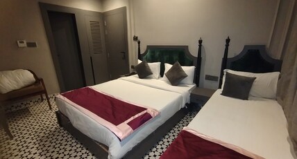 Hotel The Palassio Room Type - Triple Bed Room