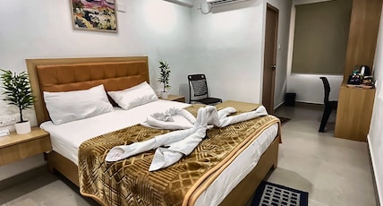 SAPTHAGIRI GRAND Room Type - Deluxe Room SAPTHAGIRI GRAND Room Type - Deluxe Room