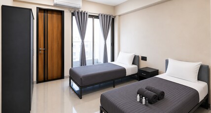 Z Express Zylos Room Type - Deluxe Twin | AC | Free WiFi