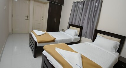 Amutham Inn Room Type - Deluxe room
