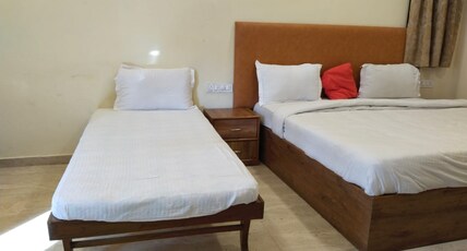 Krishn Palace Hotel and Restaurant Room Type - Family Room