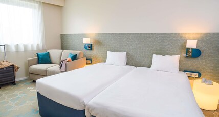 ibis Styles Tours Centre Room Type - Standard Room with two single beds and a sofa