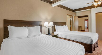 Best Western Tolleson Hotel Room Type - Suite - 1 King 2 Queen Beds, Non-Smoking, Two Rooms, Three Televisions, Microwave And Refrigerator, 