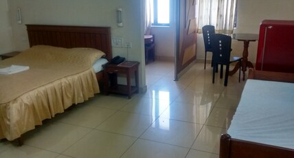 Hotel Nandhini  Room Type - AC Suite