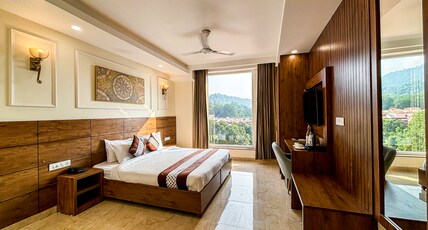 Hotel Nirvana Bliss (Behind Parmarth Niketan) Room Type - Executive Room