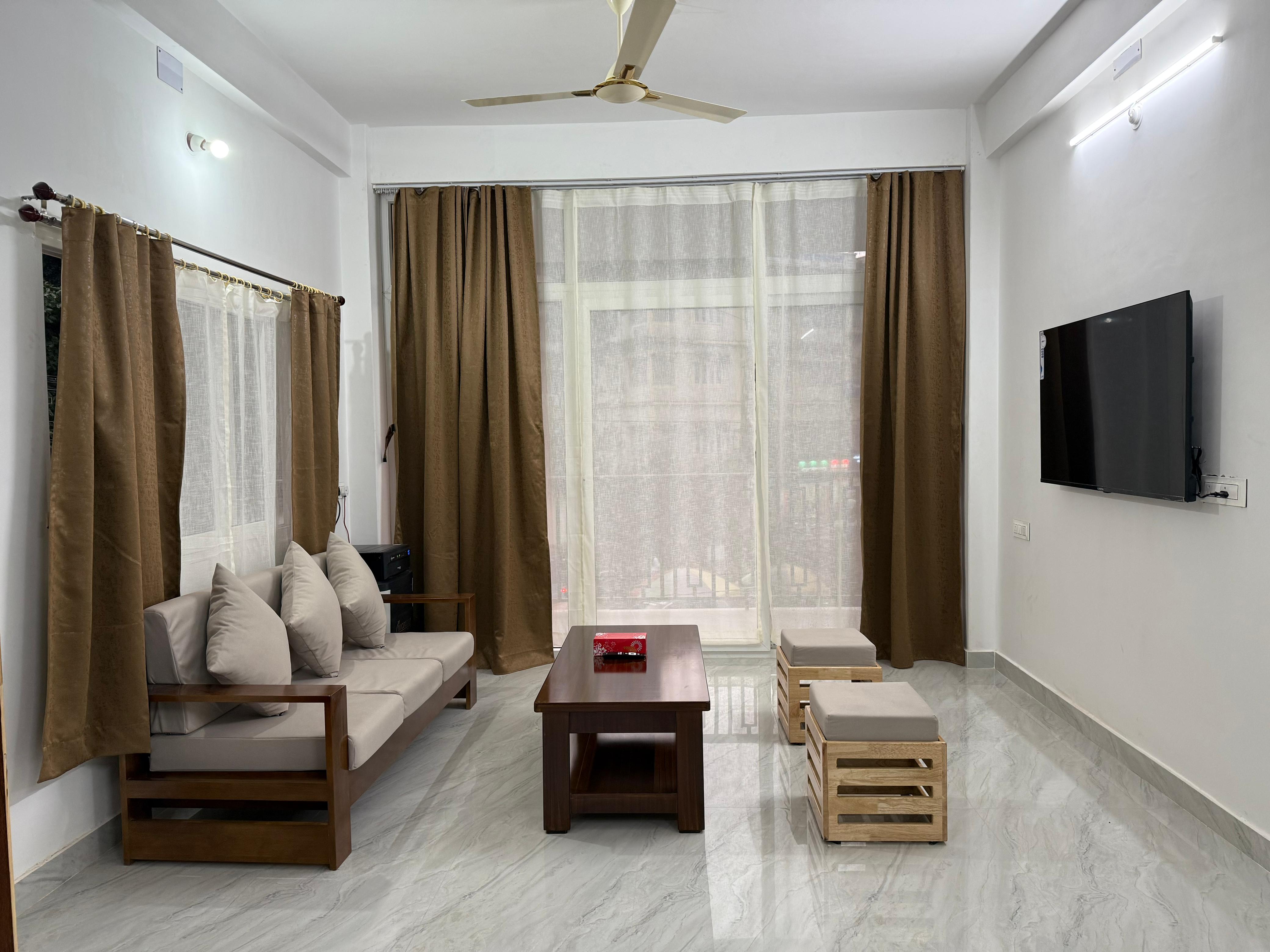 Tinhenric's Modern 3BHK Near Bhutan Gate - Tap to explore photos