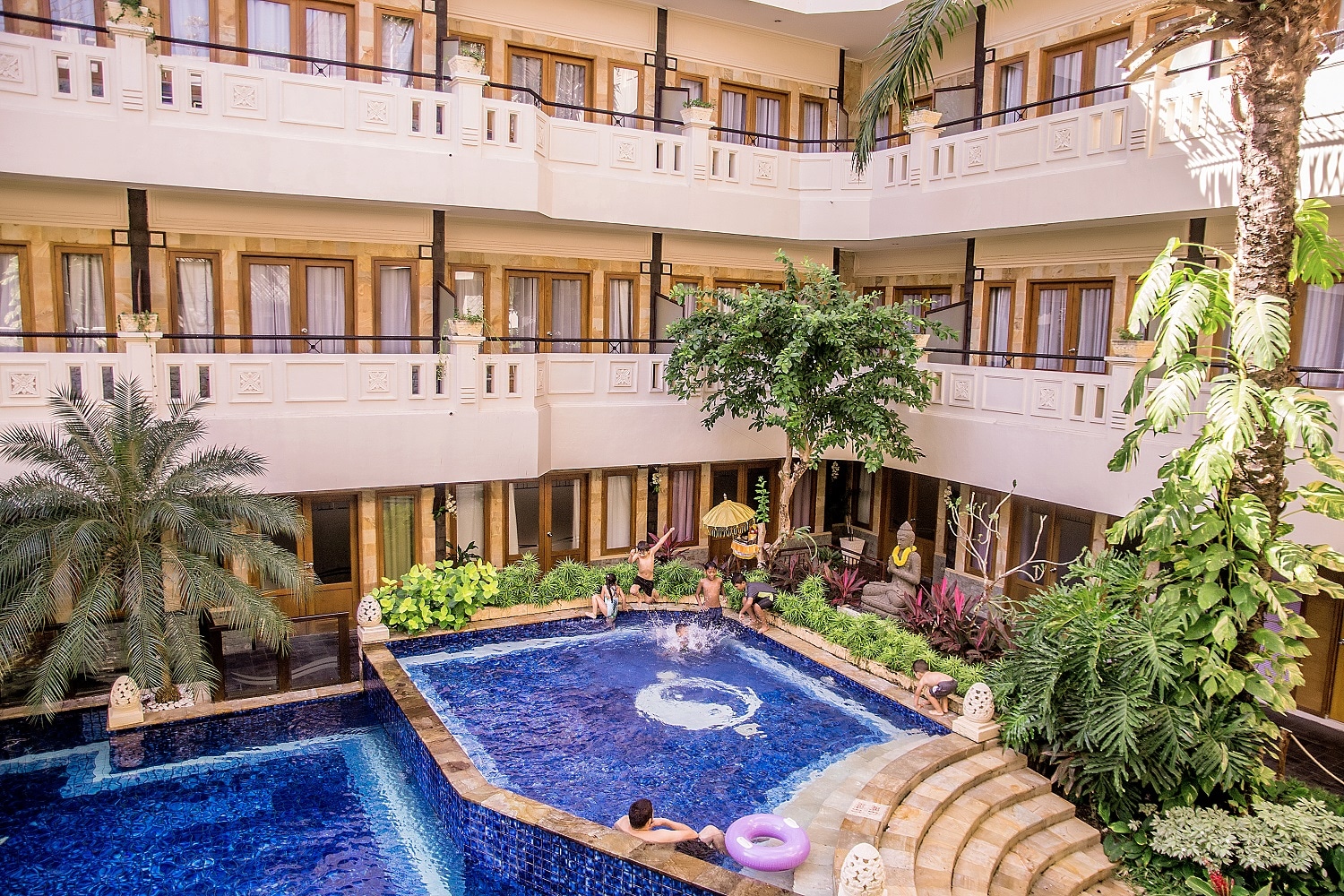 Famous Hotel Kuta - Tap to explore photos