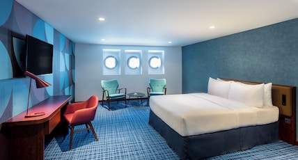 Queen Elizabeth 2 Room Type - Superior Room with 1 double bed and 1 single bed Queen Elizabeth 2 Room Type - Superior Room with 1 double bed and 1 single bed