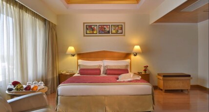 Vivanta Vadodara  Room Type - 03Deluxe Room Queen Bed