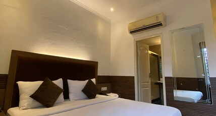 Status Business Hotel The Mall Room Type - Deluxe Room