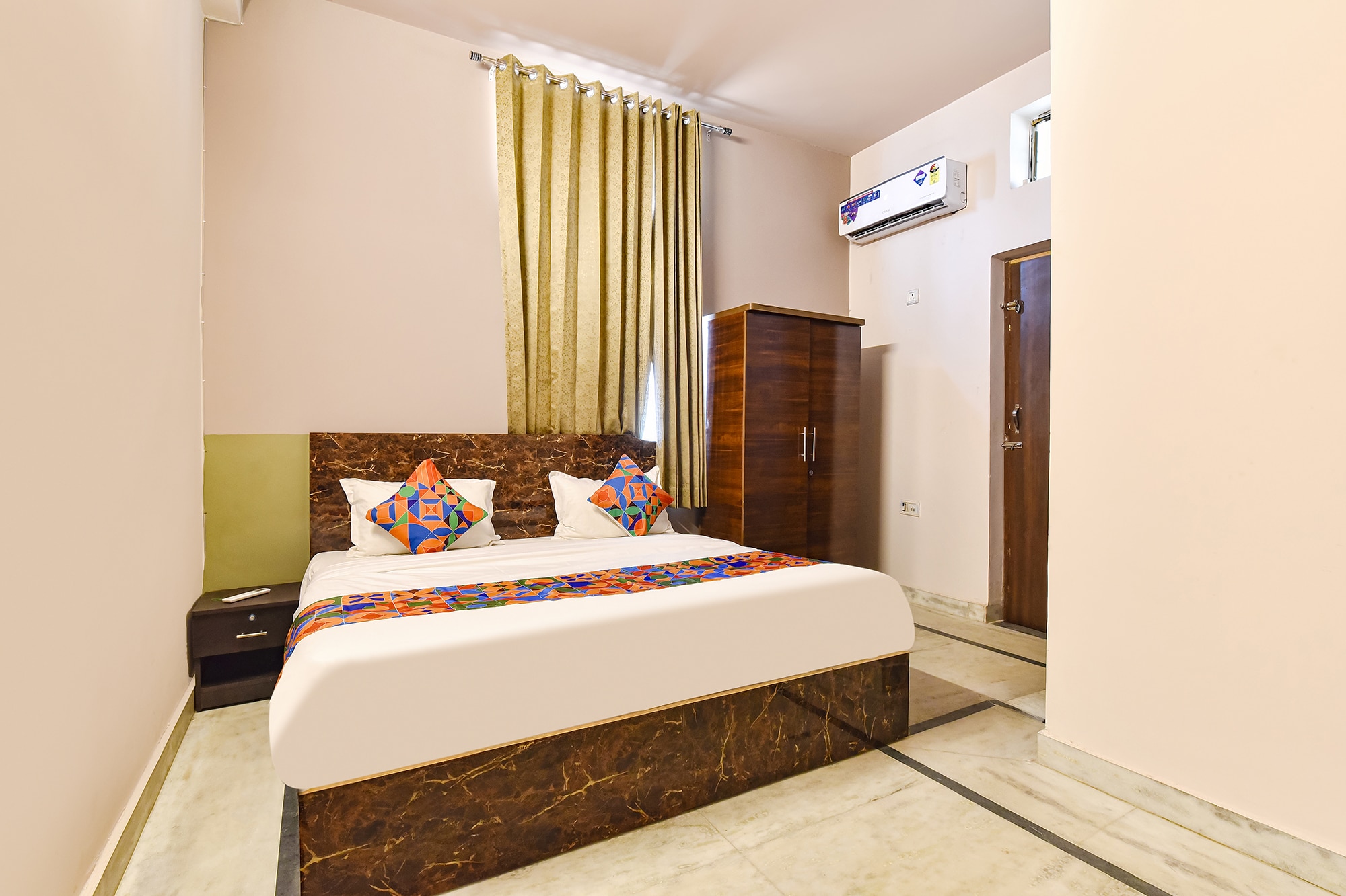 FabHotel Blue Prime - Nr Suvira Hospital - Tap to explore photos