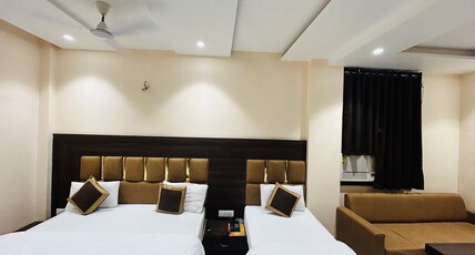HOTEL KUSUM PALACE Room Type - Triple Deluxe Room