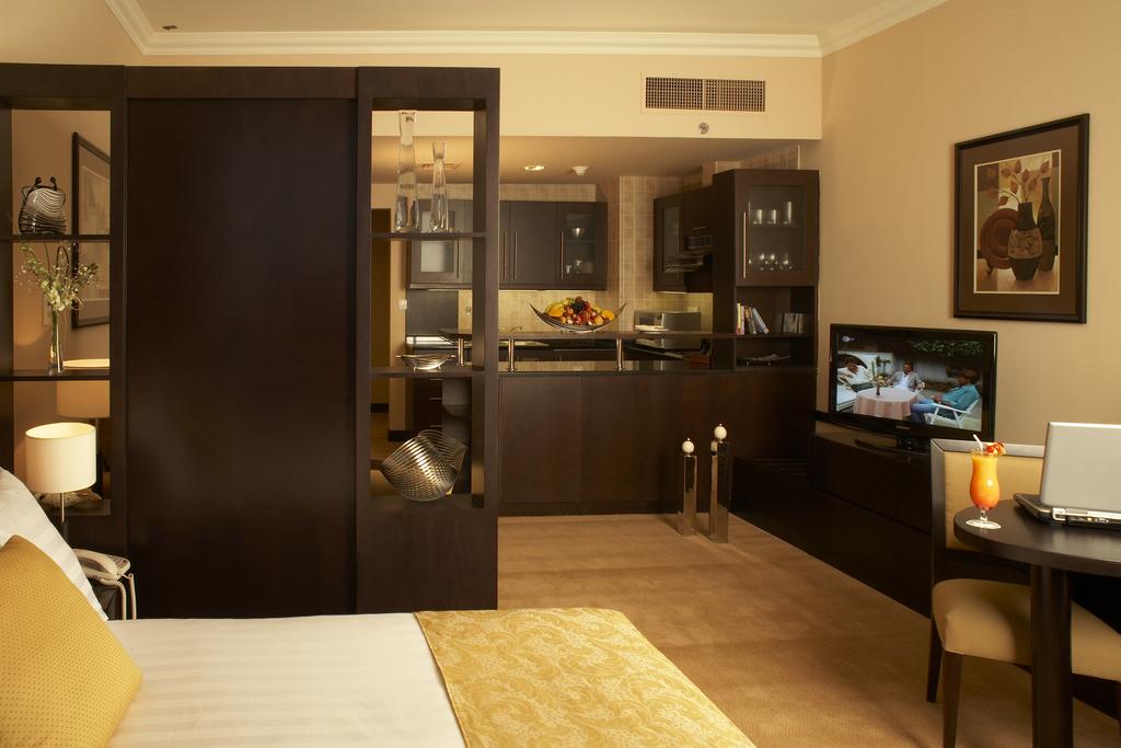Al Manzel Hotel Apartments - Tap to explore photos