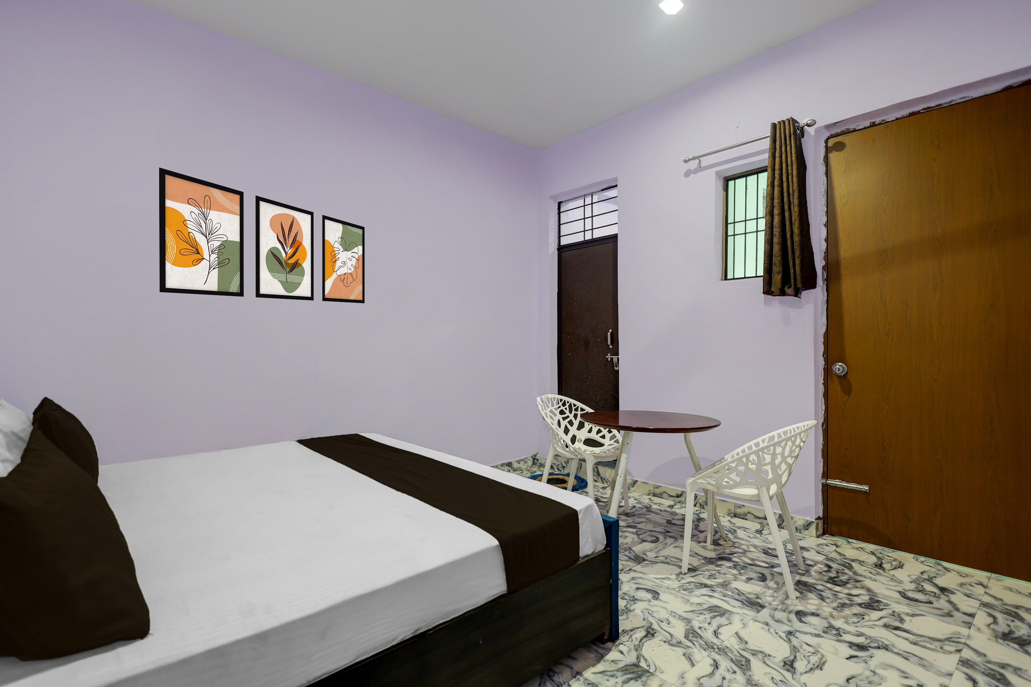 Hotel O Guru Residency - Tap to explore photos
