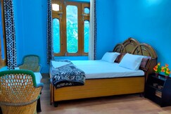 Tirthan river front farm stay.