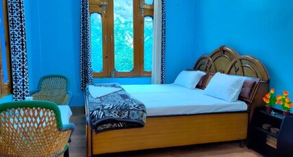 Tirthan river front farm stay. Room Type - Bedroom 2