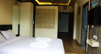 Hotel Srushti Regency Room Type - Family Suite Room AC - 2 Double Bed (With Balcony)