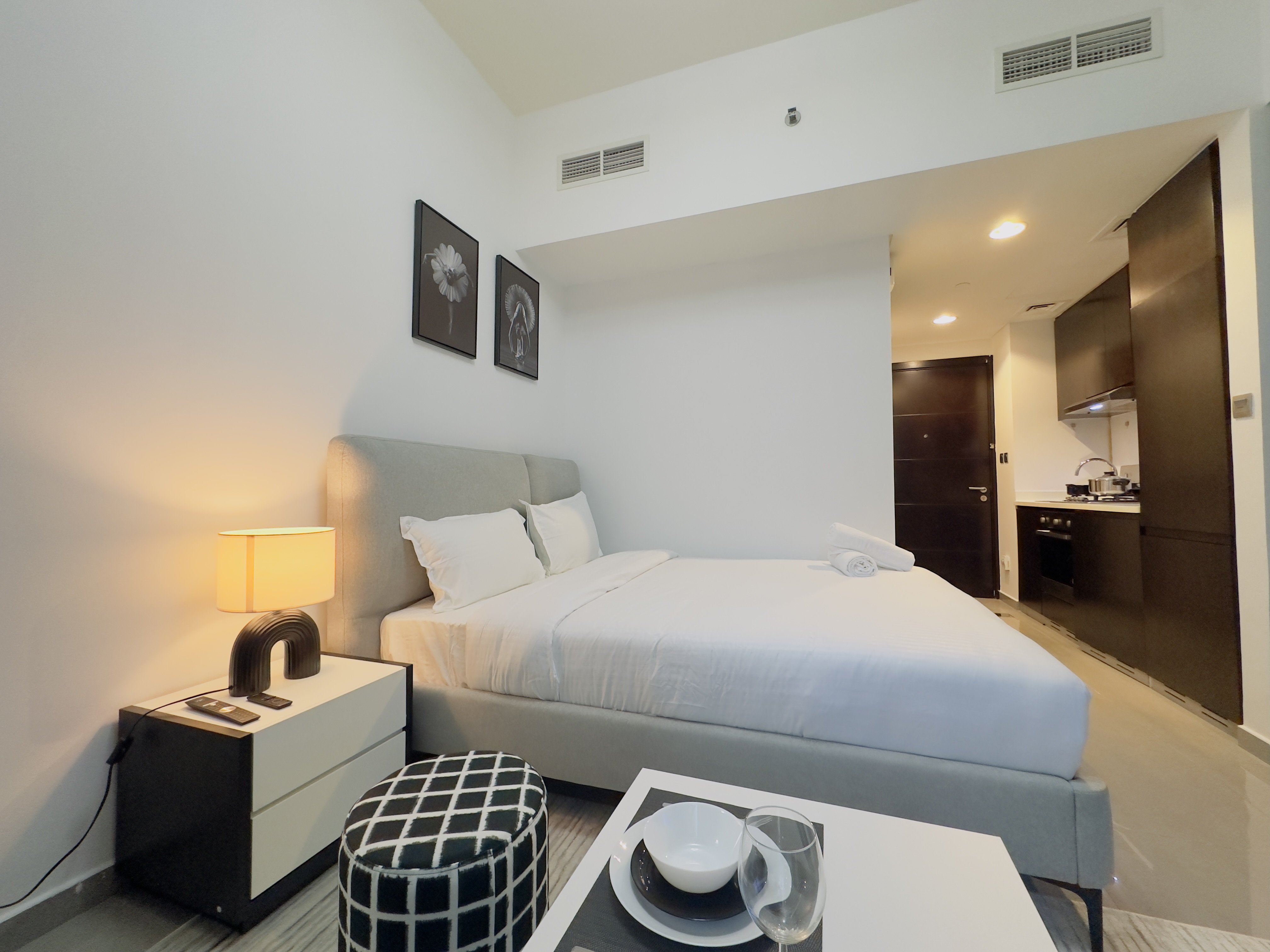 Quickstay Homes - Studio with a Pool View at Merano Tower - Tap to explore photos