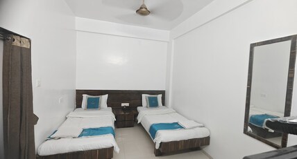 Hotel shivanand Room Type - 4 Bed AC Room