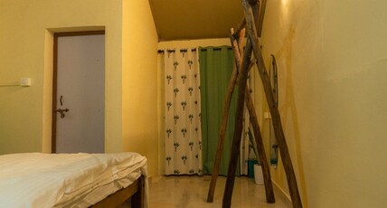 Roots by Revibe Room Type - Deluxe Double Room with Balcony