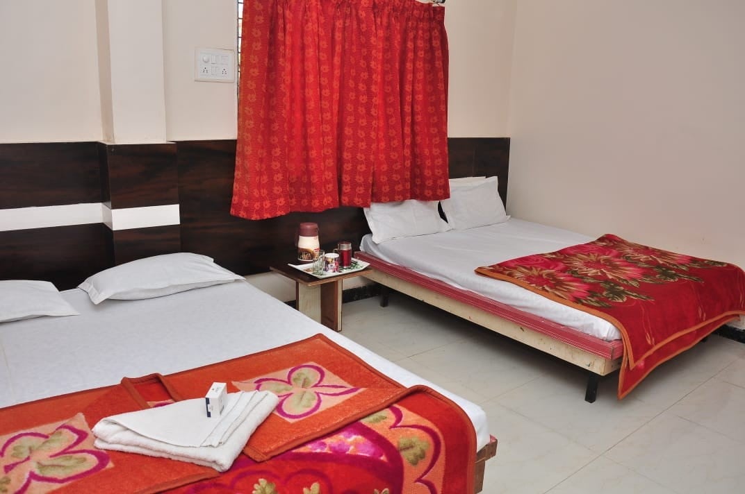 Hotel Sai Sulochana Inn - Tap to explore photos