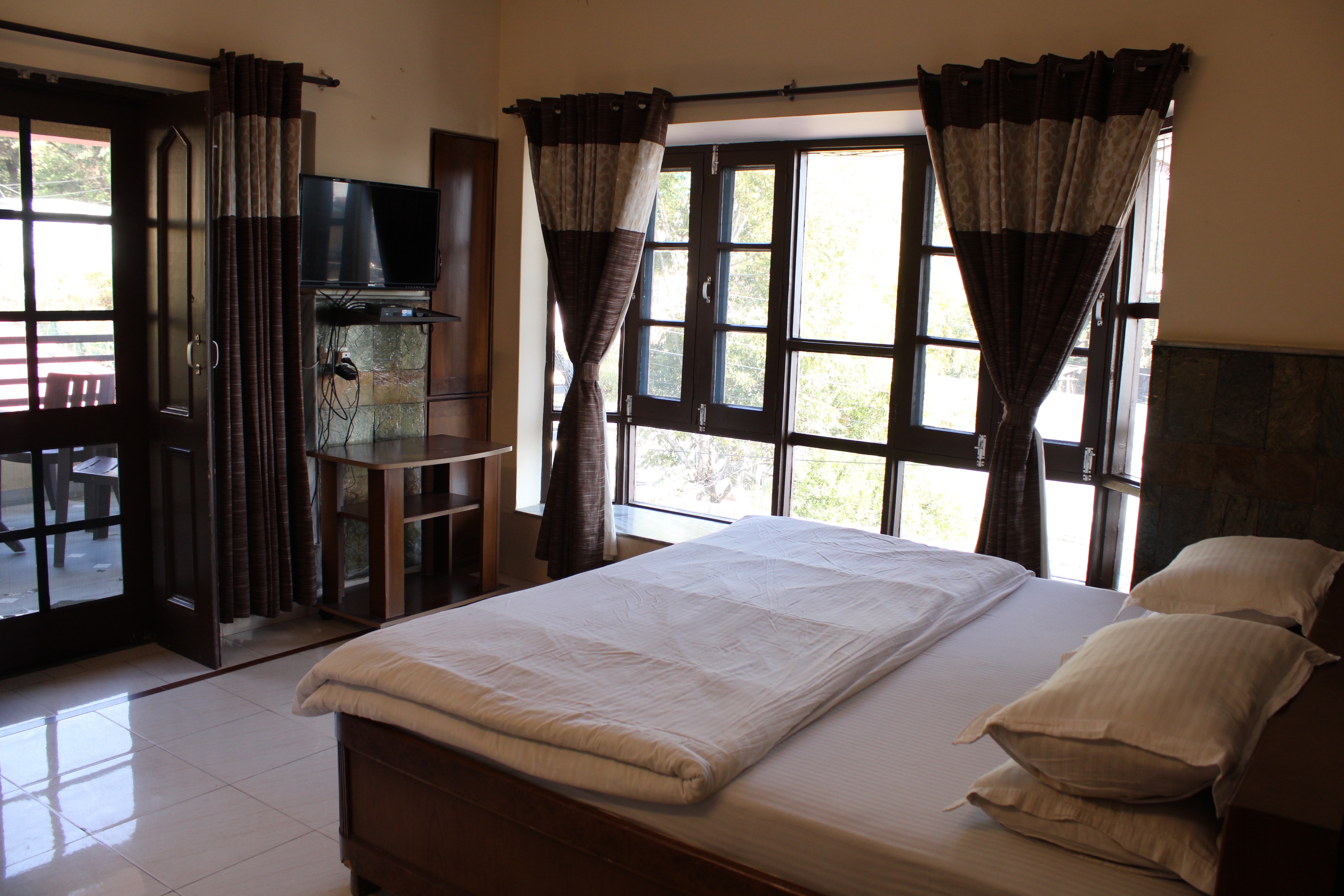 The Sojourn Gulmohar cottage - Tap to explore photos