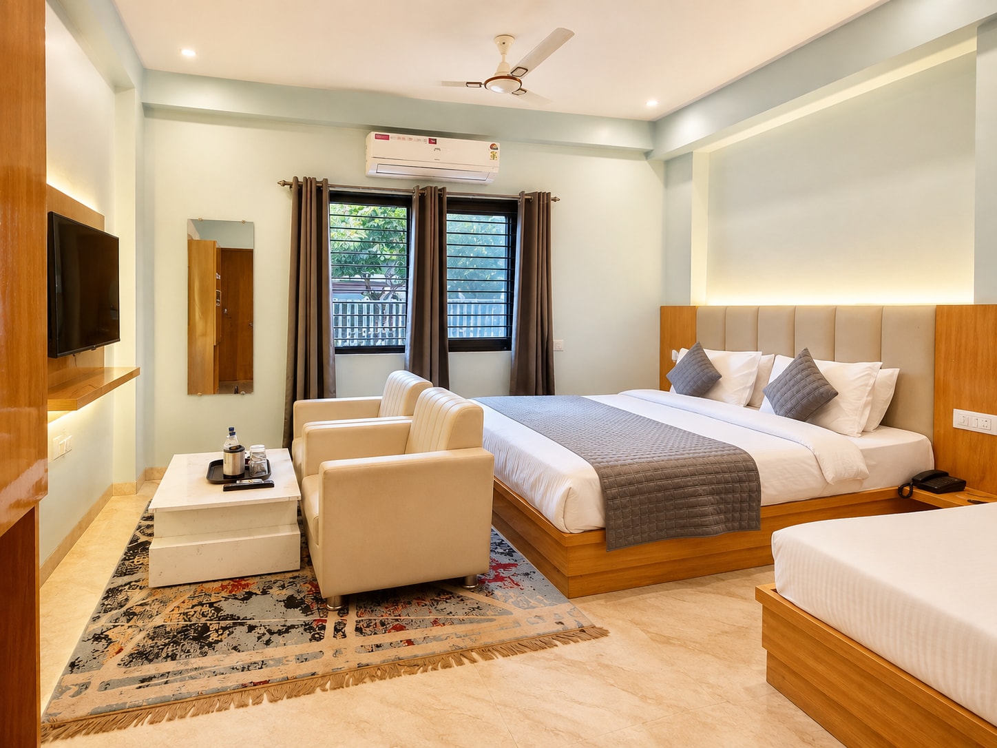 Vamika Family Suites - Tap to explore photos