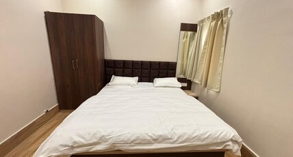 Nirvana Hotels Room Type - Non AC Deluxe King Bed